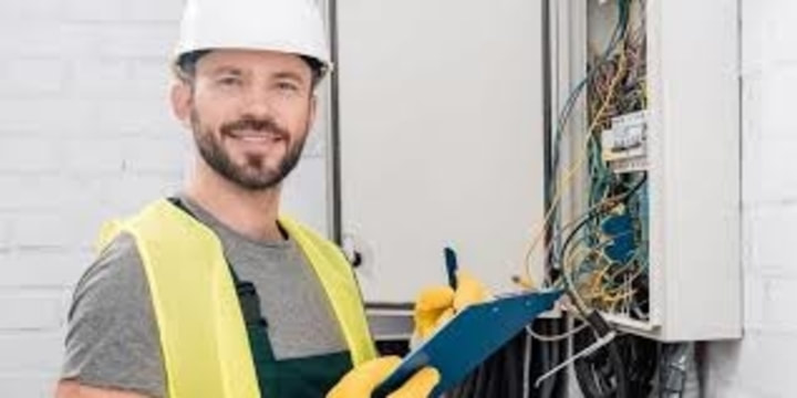 Electrician at junction box